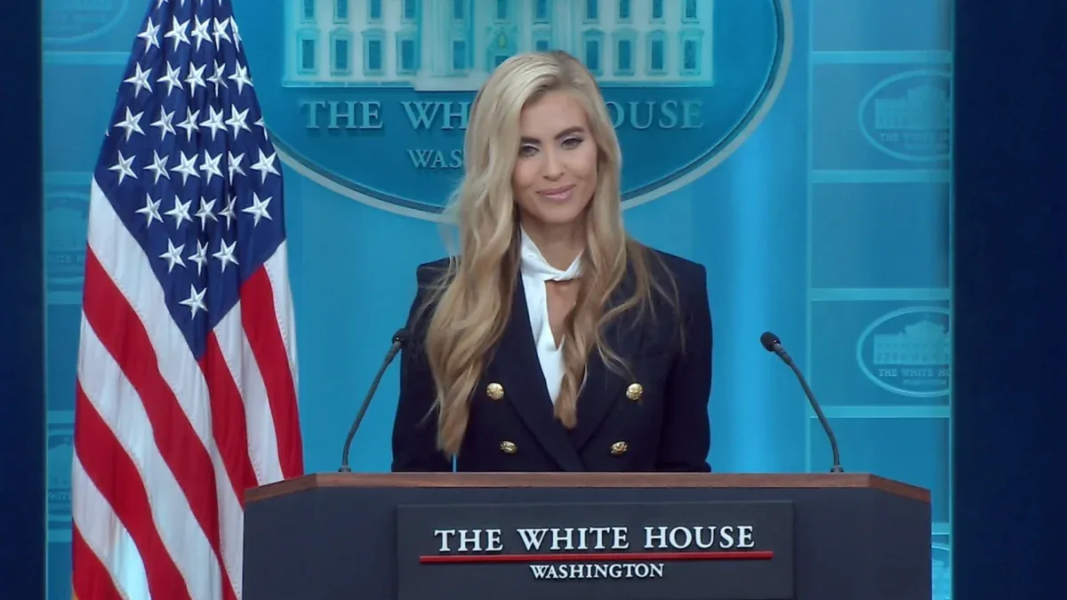 Katie Zacharia comete gafe ao citar Trump na primeira coletiva